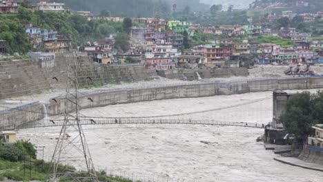 himalaya mountainous river ganges flowing through himalaya villages - cities in uttarakhand, india.