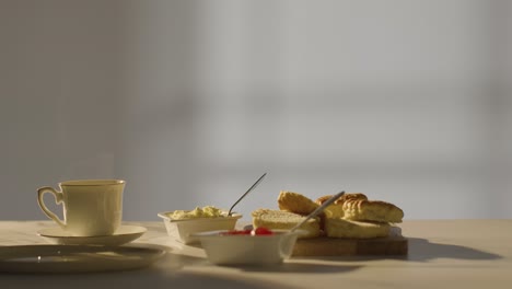 Studio Shot Of Traditional British Afternoon Tea With Scones Cream And Jam 1