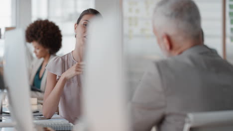 beautiful business woman chatting to colleague discussing work having conversation in office enjoying teamwork