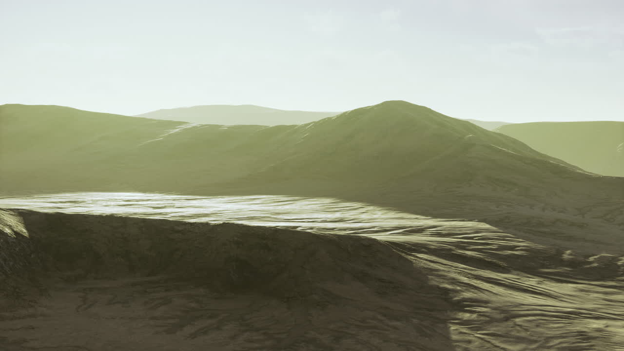 Sunrise over rugged terrain reveals tranquil beauty in remote landscape