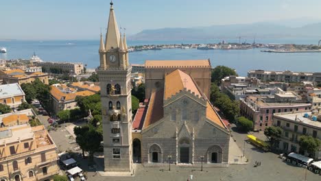 aerial boom shot above messina cathedral in beautiful sicilian city