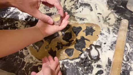 the process of making gingerbread cookies with molds for easter