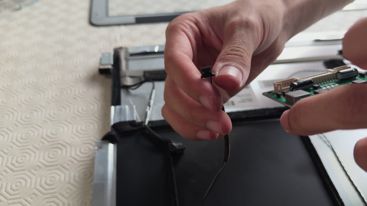 Man self repairing a computer