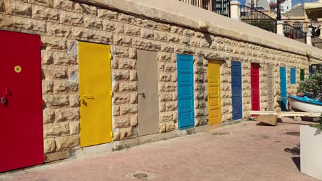 Colourful--doors-in-Spinola-Bay,-Malta,-Mediterranean-Island