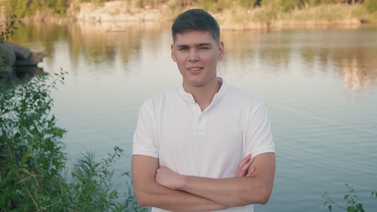 Portrait of Young Man at Lake