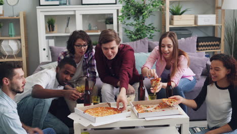 friends enjoying pizza party at home