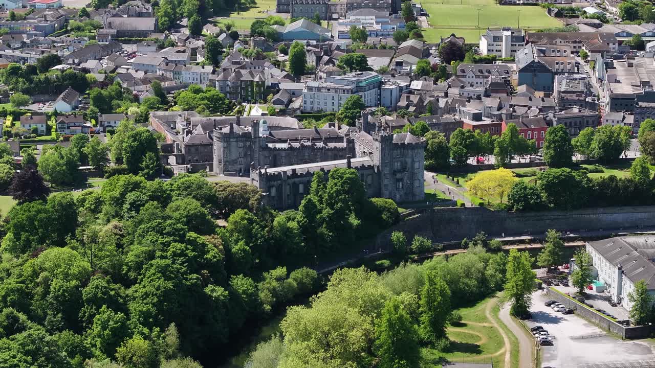 Kilkenny Castle by the river Nore, aerial view. Sunny day, panorama. Ireland