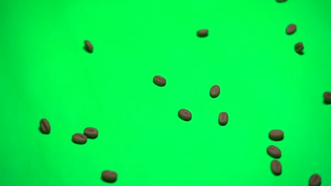 coffee beans falling down in background croma closeup top view