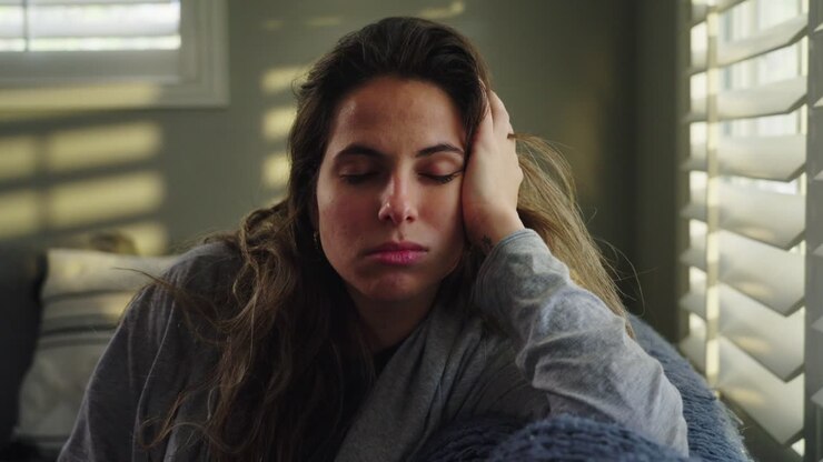 Woman is in a lot of pain and discomfort