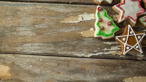 falling snow with christmas cookies