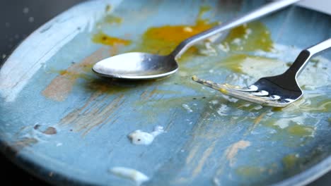 empty plate after eating on table ,