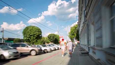 city street scene with people and buildings