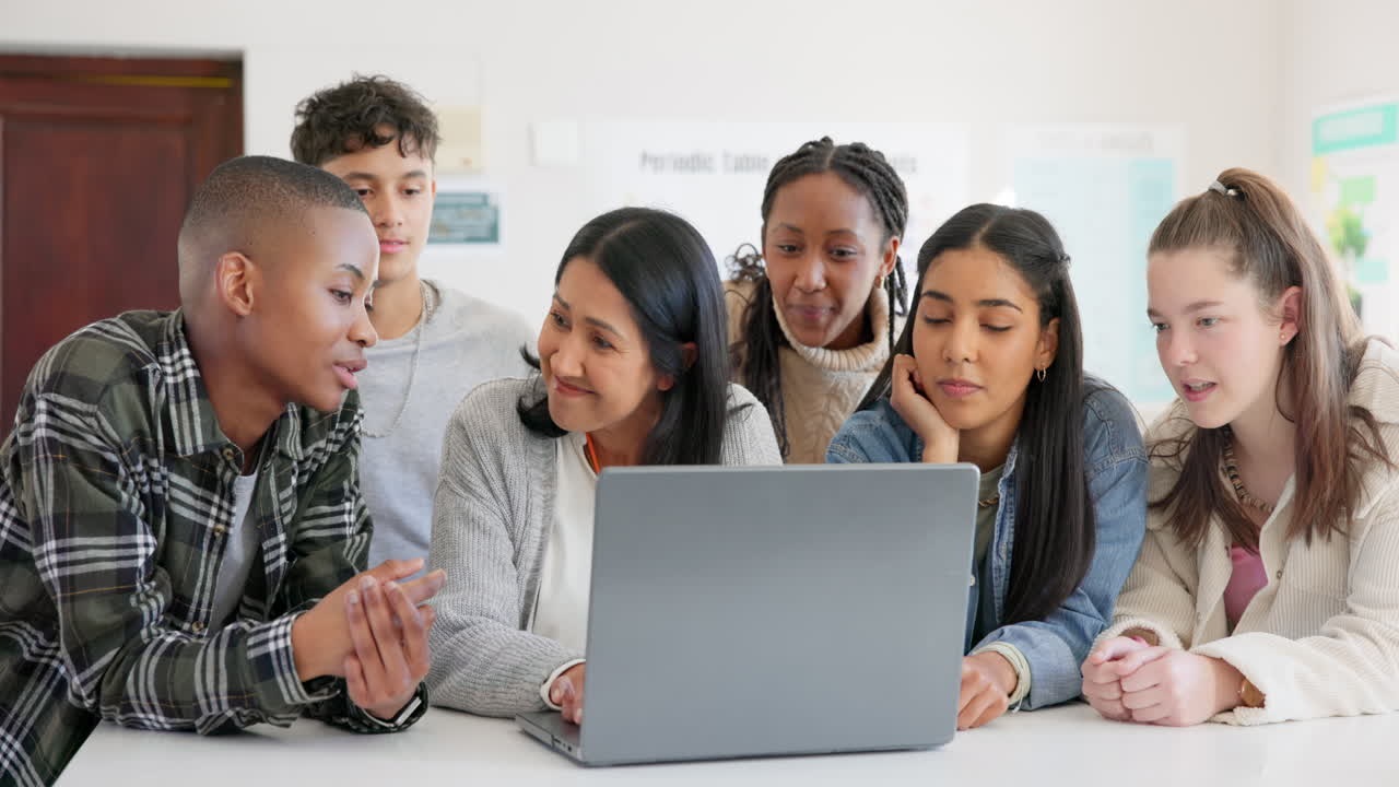 Teacher, laptop and group of students