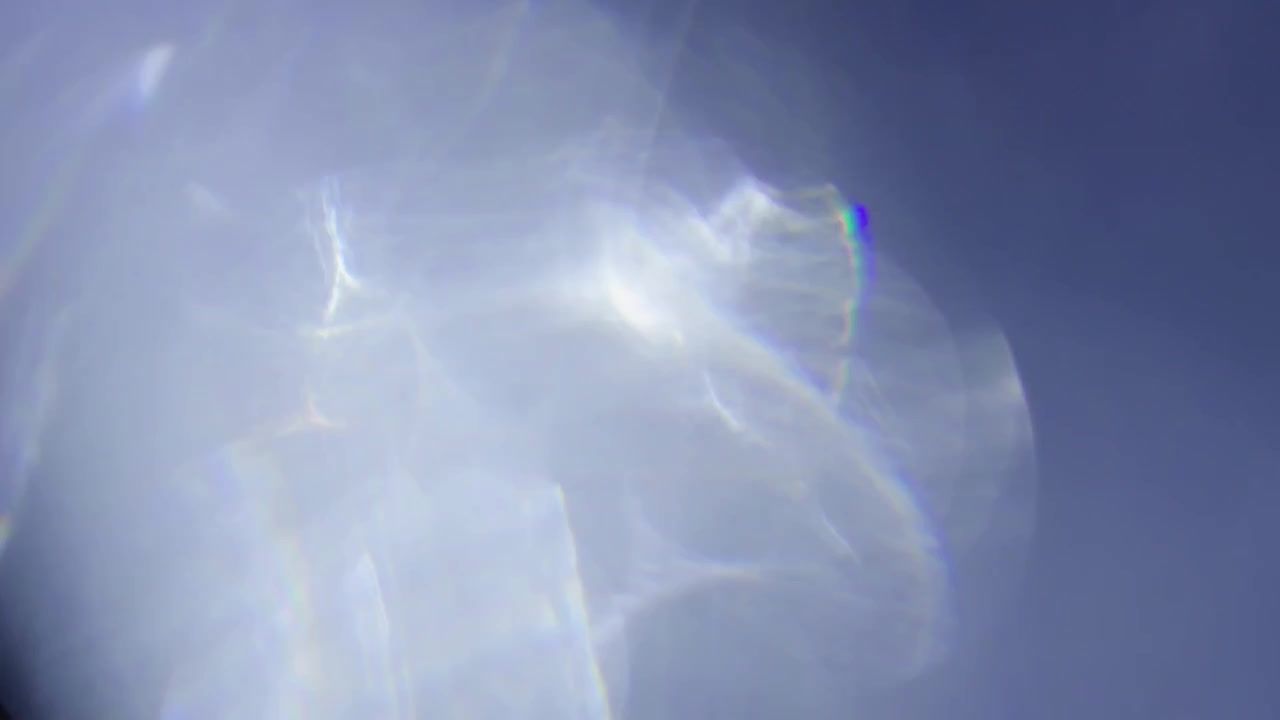 Abstract Light Leaks and Lens Flares on Dark Background