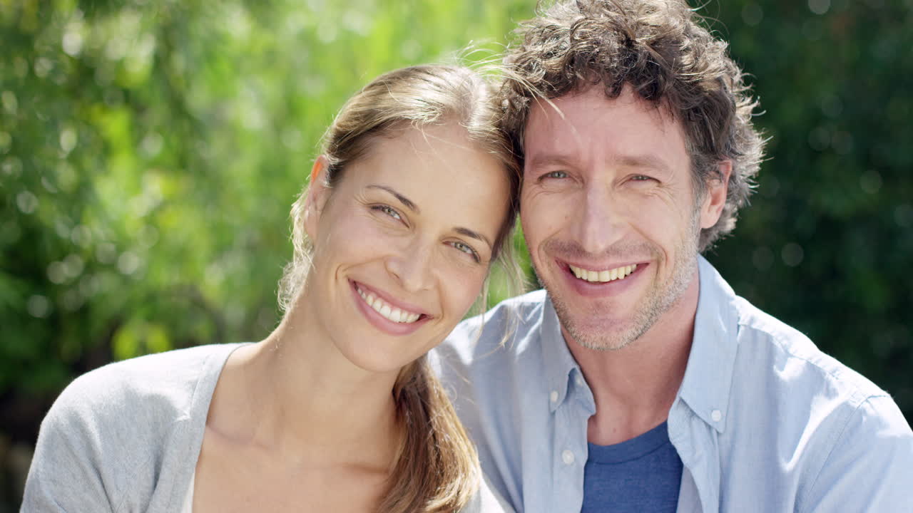 Attractive couple smiling portrait slow motion