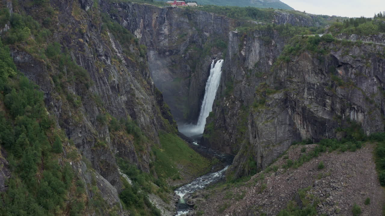 Majestic Waterfall in a Norwegian Canyon