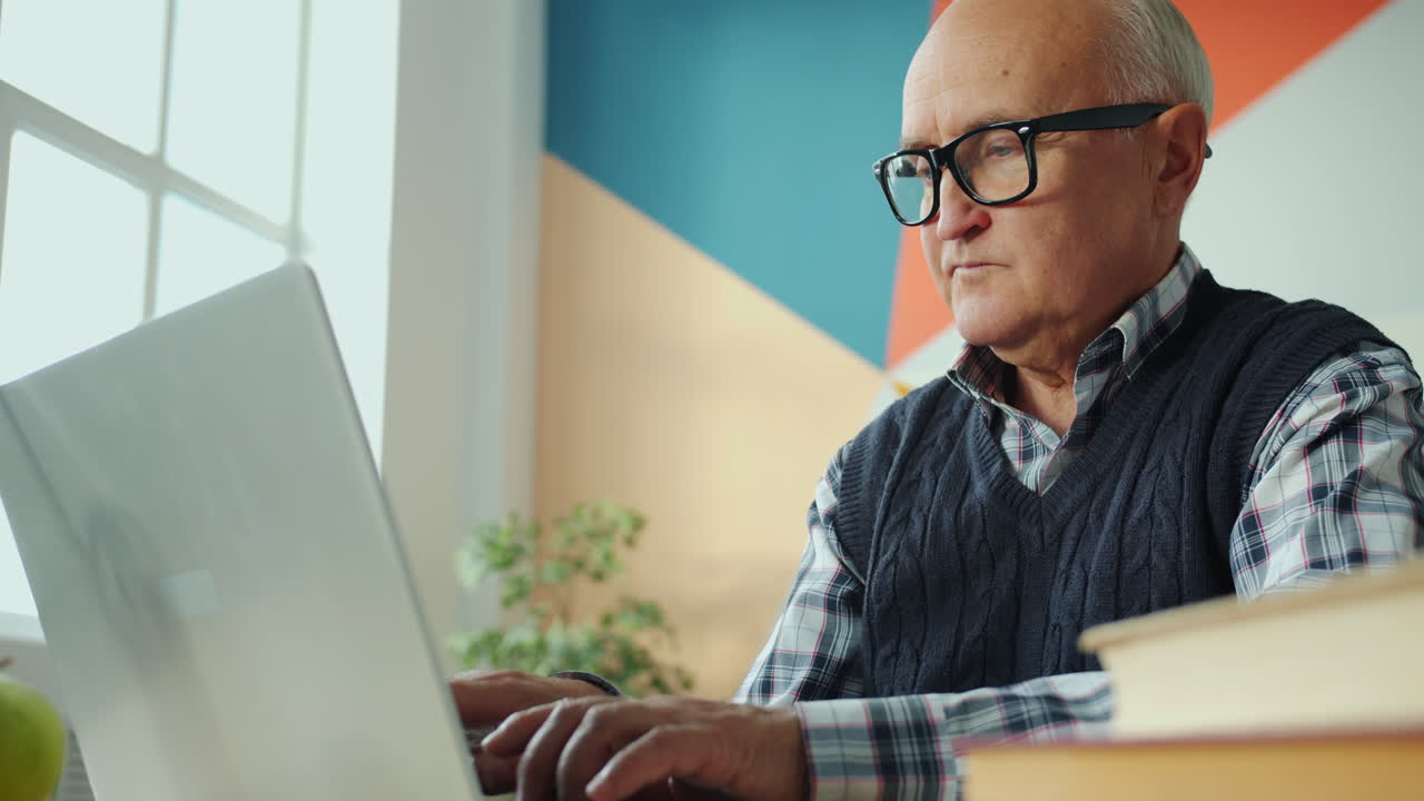 Older Man Working on Laptop