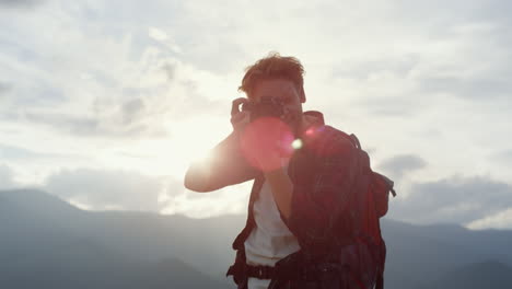 closeup smiling traveler photographing nature. tourist shoot mountains view.