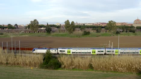 Train-Going-Past-A-Roman-Acqueduct