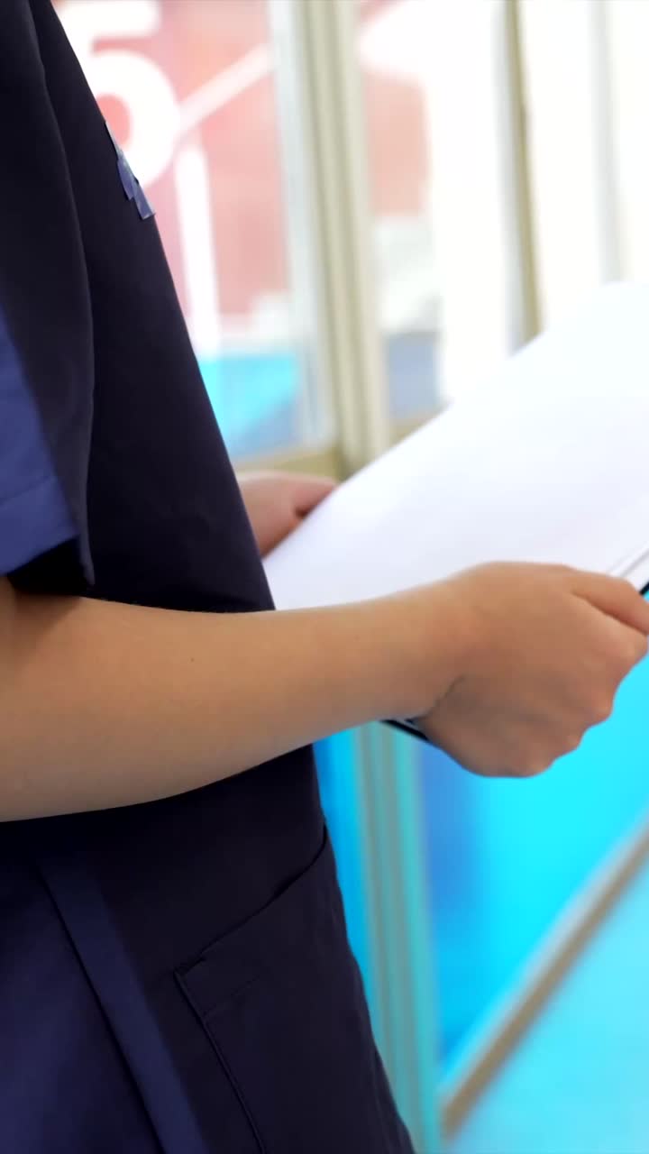 Person holding clipboard