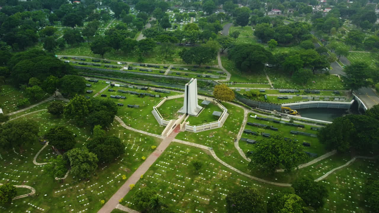 Drone approaching the Manila memorial park - Sucat, in Parañaque, Philippines