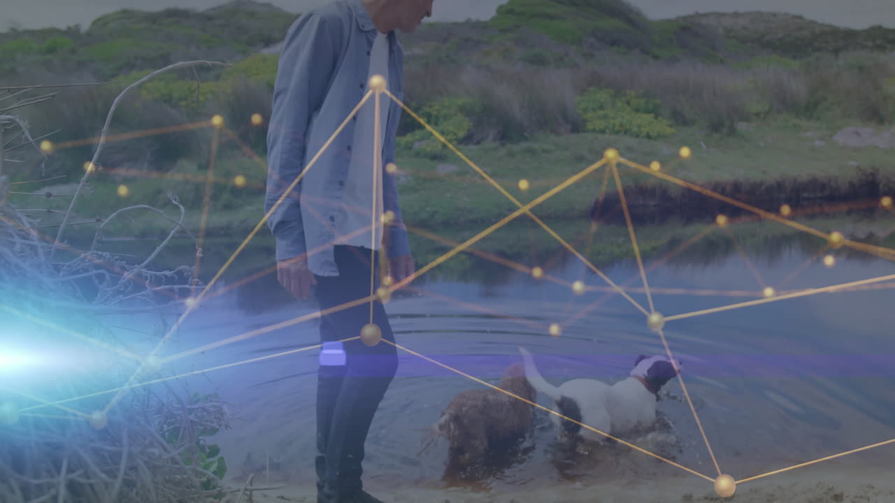 man exploring shallow pond water, with glowing digital network nodes showcasing technology