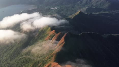 a time-lapse video of slow moving clouds moving along the ridge of the lantau peak (960m) in lantau island, the largest island in hong kong.landscape of lantau island, hong kong, china