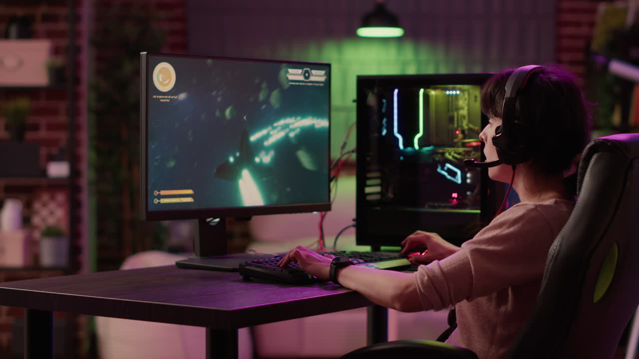 Gamer girl celebrating winning first place in space shooter online multiplayer tournament