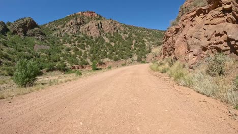 scenic dirt road through a canyon in colorado