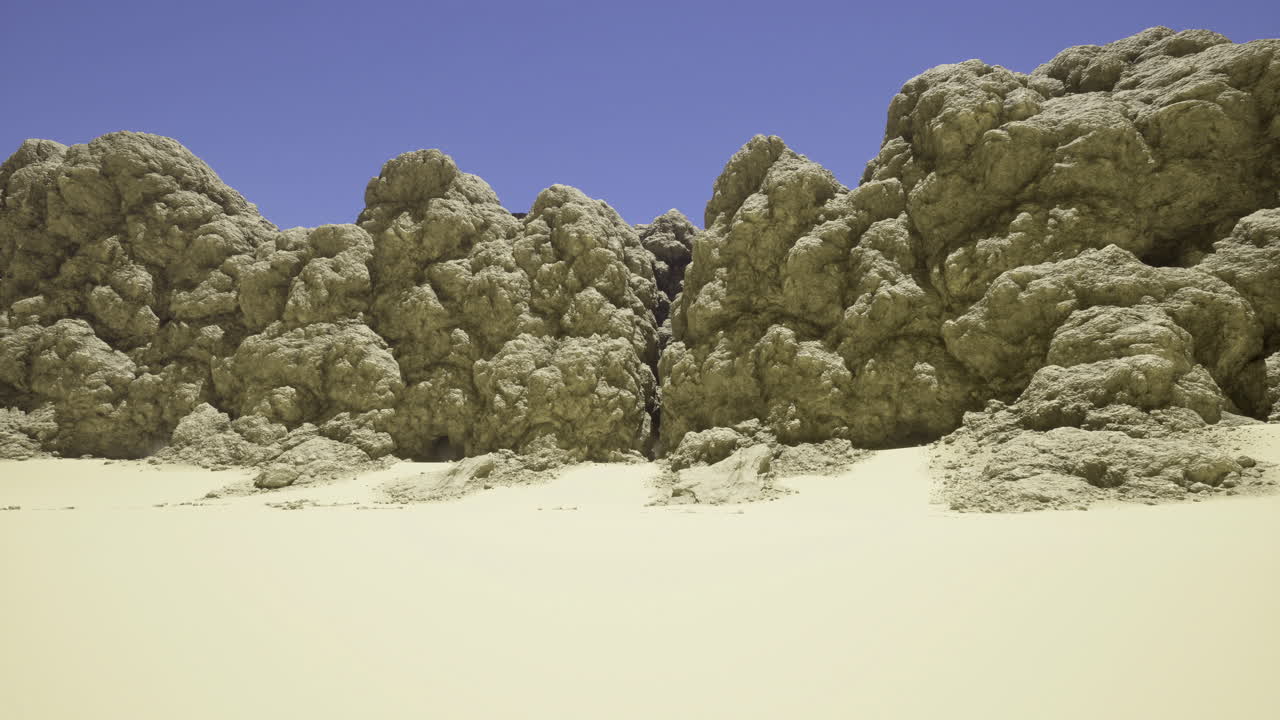 Impressive rock formations against a clear blue sky in a desert landscape
