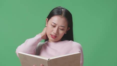 young woman reading a book