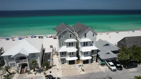 Modern Accommodation Buildings With View Of The Turquoise Beach Water In The Panama Resort Town, Bay County, Florida, United States. Drone Shot