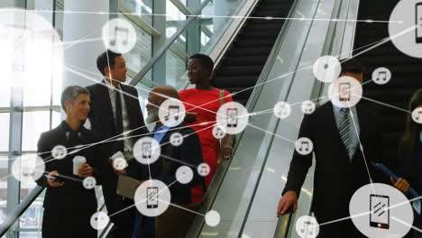 network of profile icons against diverse businesspeople on escalator at office