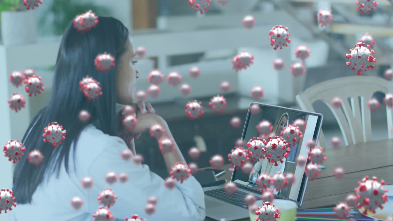 Animation of covid 19 cells a over businesswoman on laptop video call