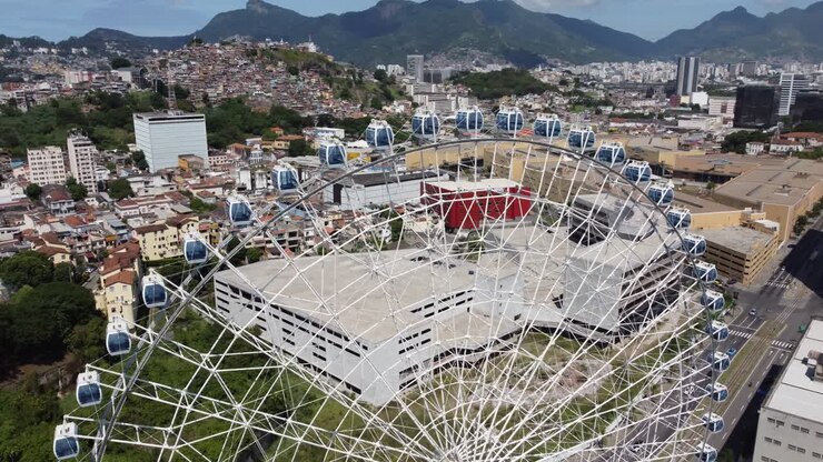 Rio de Janeiro, Brazil. Downtown district of Rio de Janeiro, Brazil.. Aerial landscape of landmark of downtown city. Rio Star attraction tourism point. Famous Rio Niteroi Bridge at background. Rio de Janeiro, Brazil.