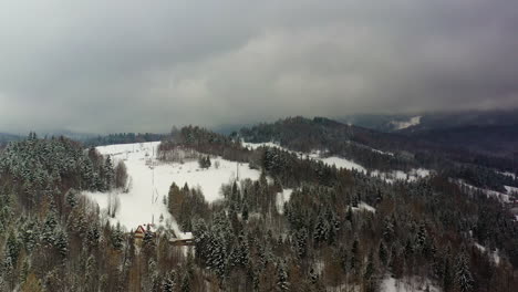 snowy mountain landscape with cabin