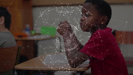 animation of globe with network of connections over schoolboy writing