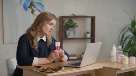 businesswoman presenting a cosmetic product on a video call