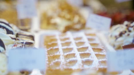 delicious brussels waffles on display at a food shop in brussels, belgium