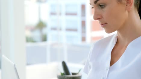 portrait of therapist using her laptop