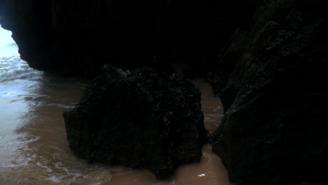 Looking-at-the-rocks-at-the-beach-in-Thailand