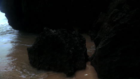 looking at the rocks at the beach in thailand