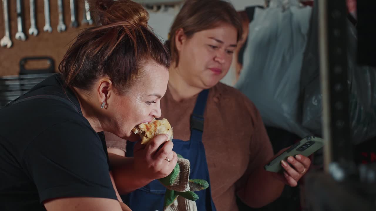 Women working in a garage