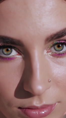 close-up of woman with vibrant makeup