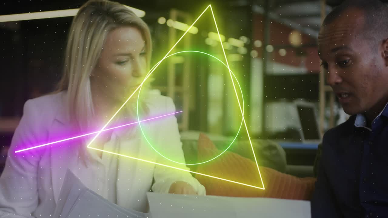 Animation of glowing circle and data processing over diverse business people working in office