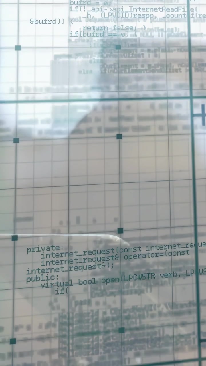Vertical video: Woman moving phone, causing code scrolling on glass, revealing focus and reflection