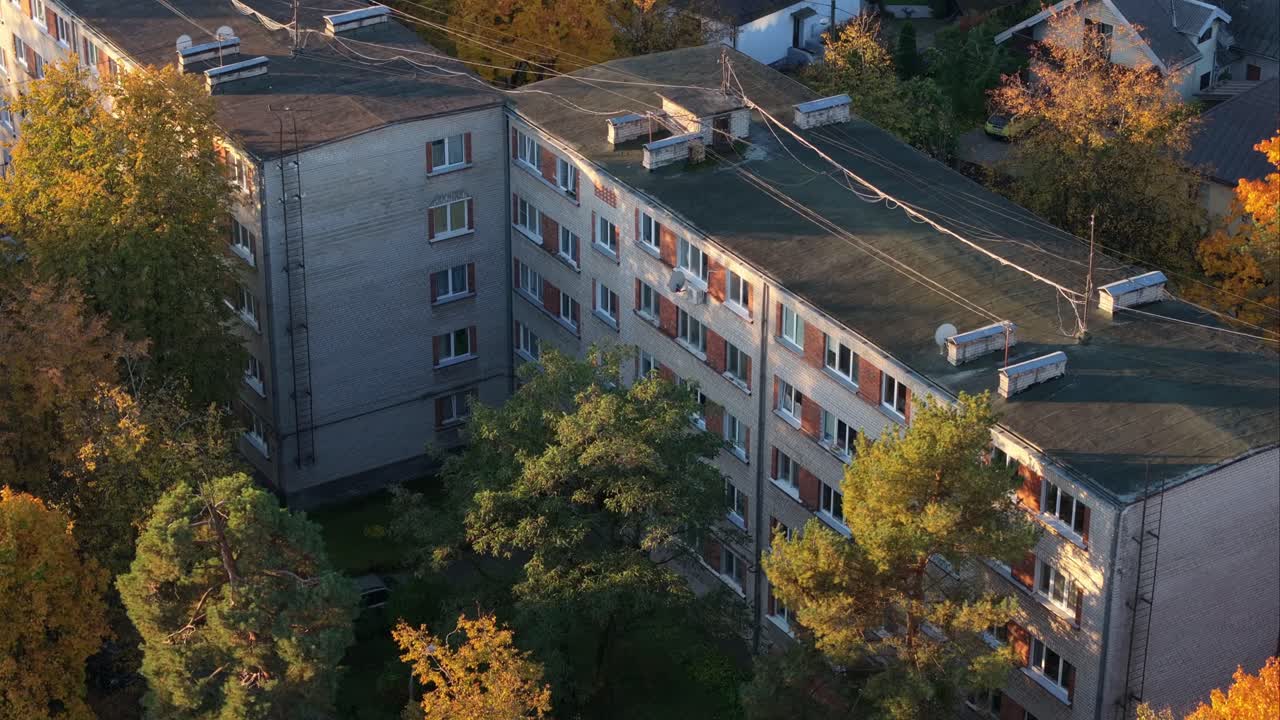 Khrushchyovka Building in 4K - Drone Flies Closer at Autumn Sunrise