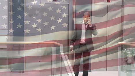 animación de la bandera estadounidense ondeando sobre un empresario afroamericano