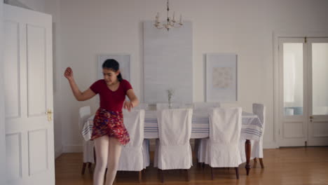 happy-teenage-girl-dancing-having-fun-dance-celebrating-playful-teen-enjoying-freedom-at-home-4k-footage