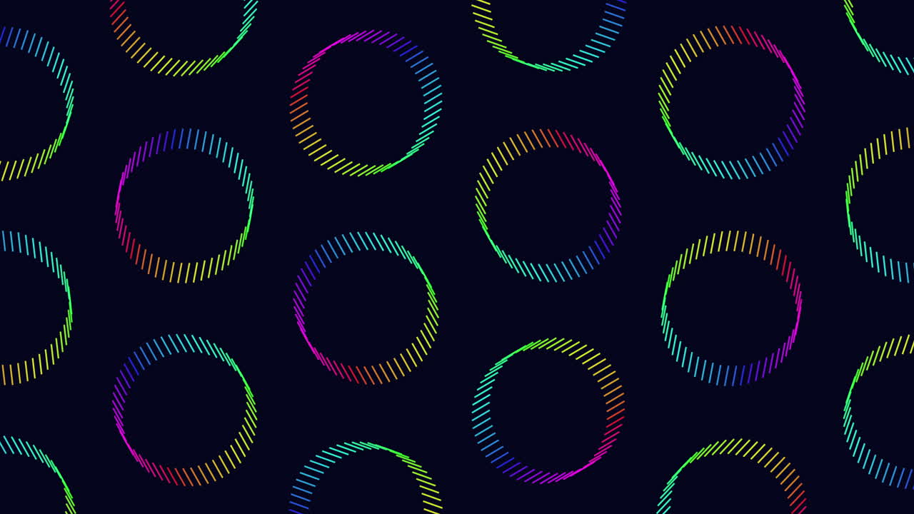 Dynamic spiral pattern of colorful circles on black background